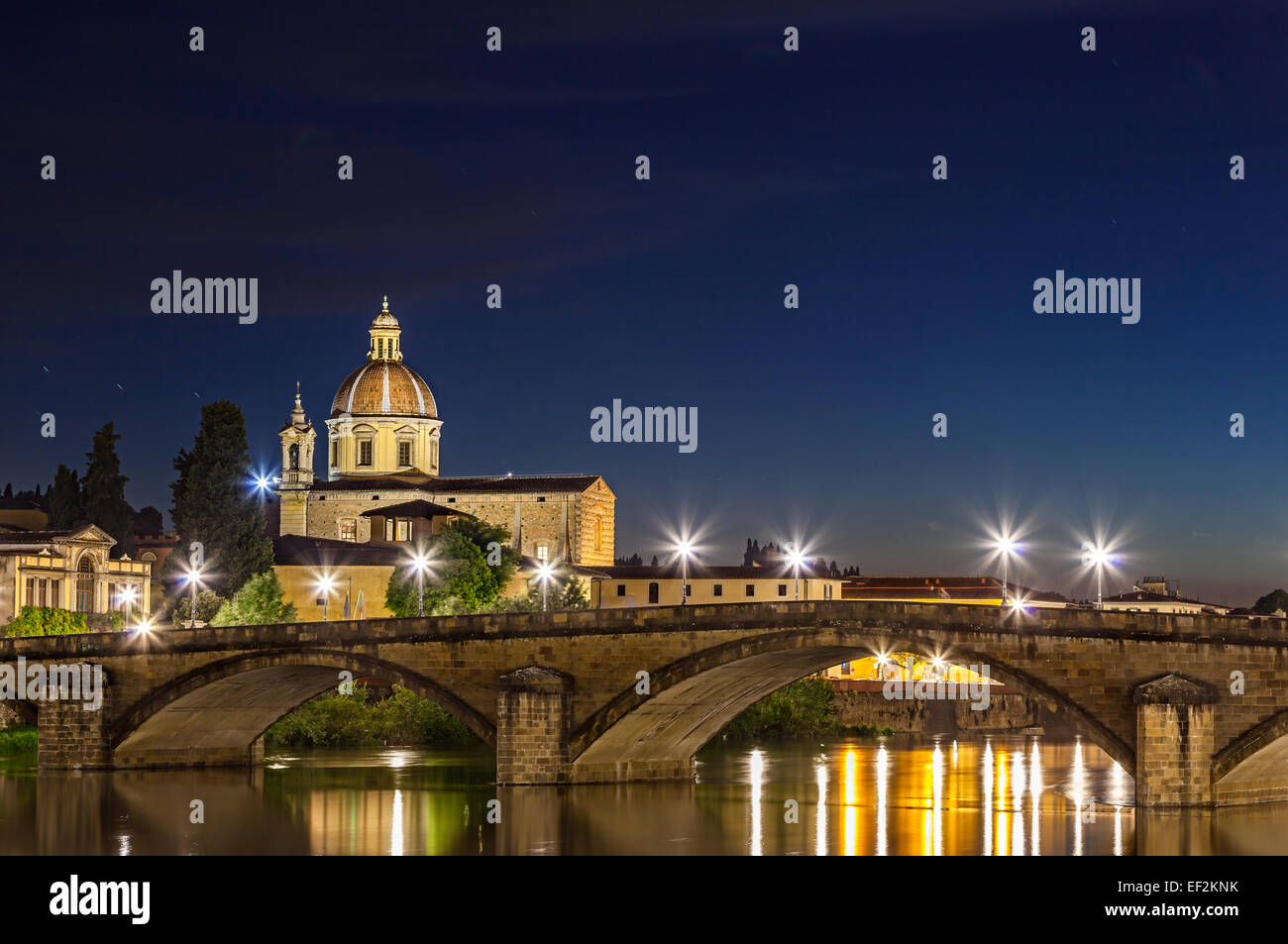 Cathedral by Arno River in the city of Florence, Italy. Stock Photo