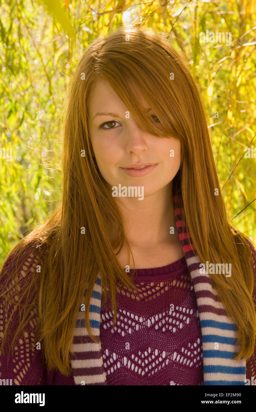 Young woman in a park Stock Photo - Alamy