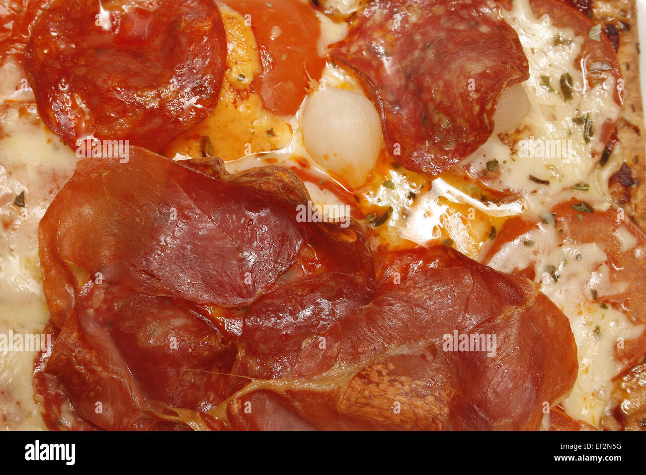 image of homemade pizza covered with meat slices Stock Photo