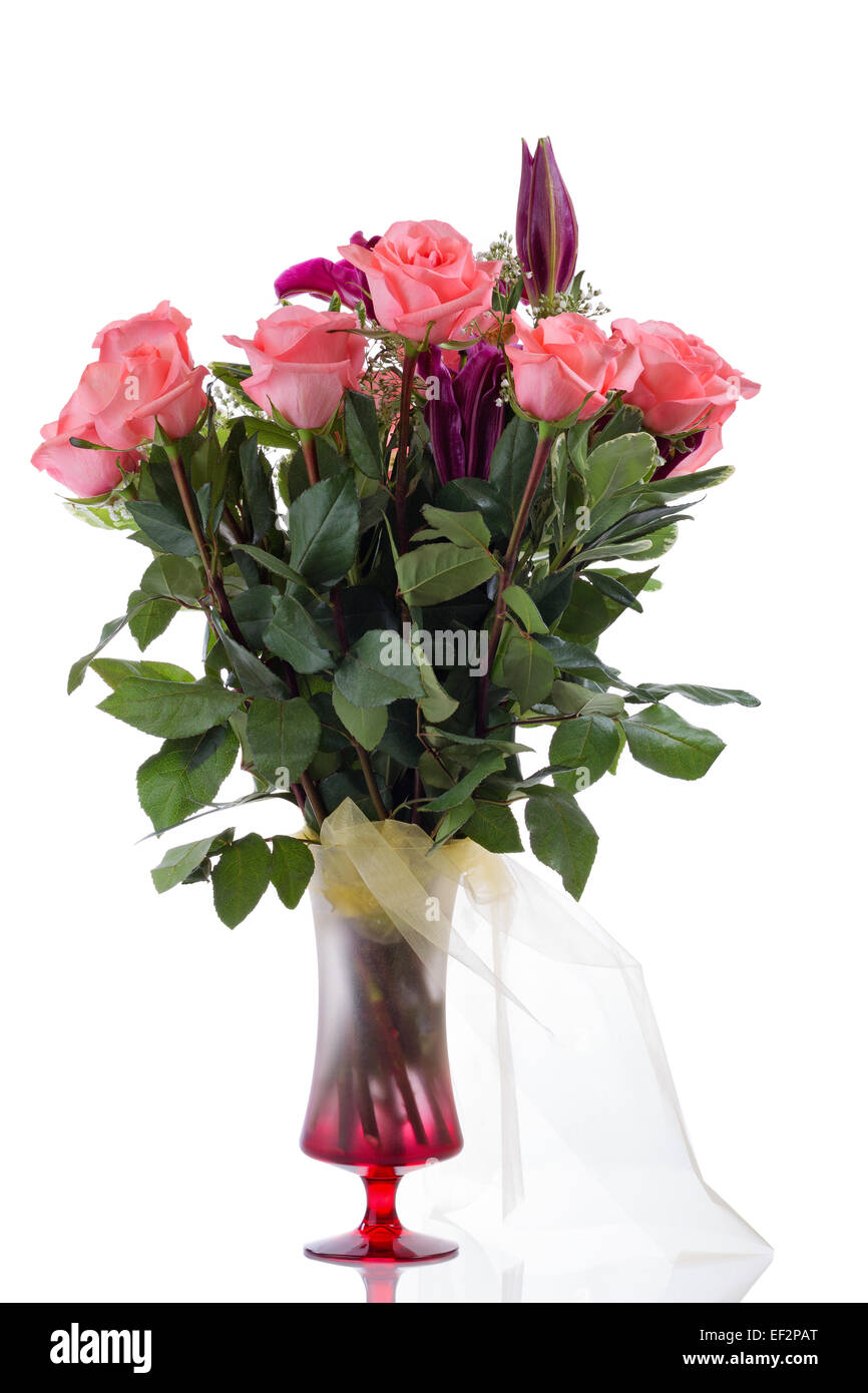 Pink Roses And Flowers Inside Red Glass Vase With Golden Cloth
