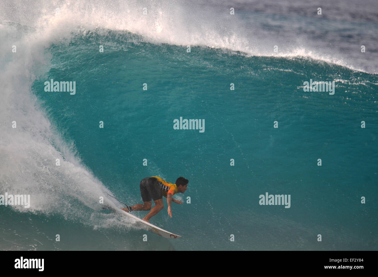 Brazilian pro-surfer, Gabriel Medina, rides the 'pipeline' at the 2014 Pipemasters, Banzai Pipeline, Ehukai Beach Park, Hawaii Stock Photo