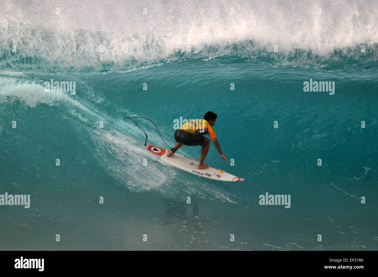 Brazilian pro-surfer, Gabriel Medina, rides the 'pipeline' at the 2014 Pipemasters, Banzai Pipeline, Ehukai Beach Park Stock Photo