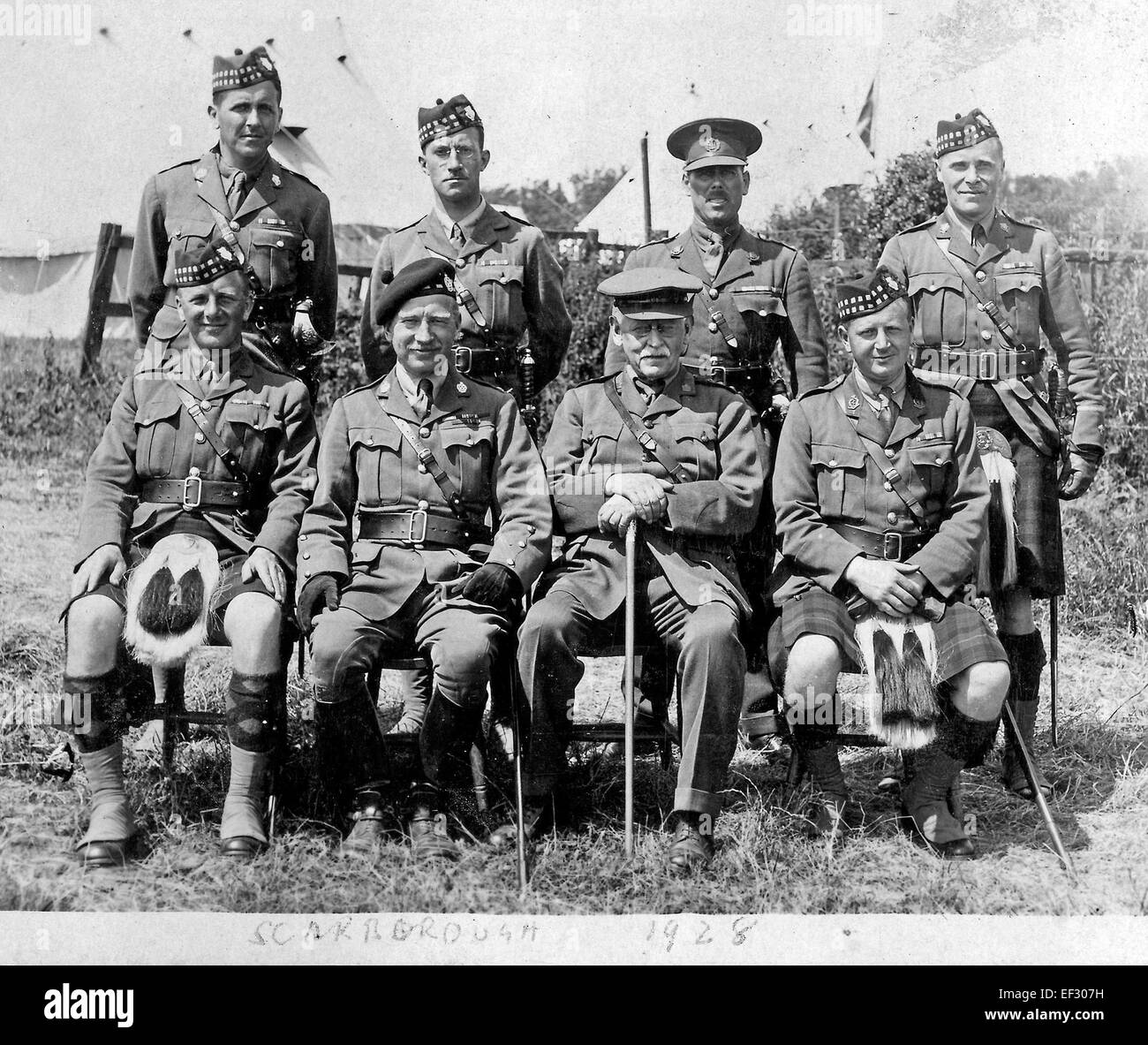 1928 - Scarborough.  AUOTC's medical and infantry contingent officers.  Seated: second from left CO Harry Butchart, third from left Principal Smith.  Standing: second from left Eric Linklater, third from left Arthur Brocks (University Director of Physical Education), fourth from left Jimmy Fraser. Stock Photo