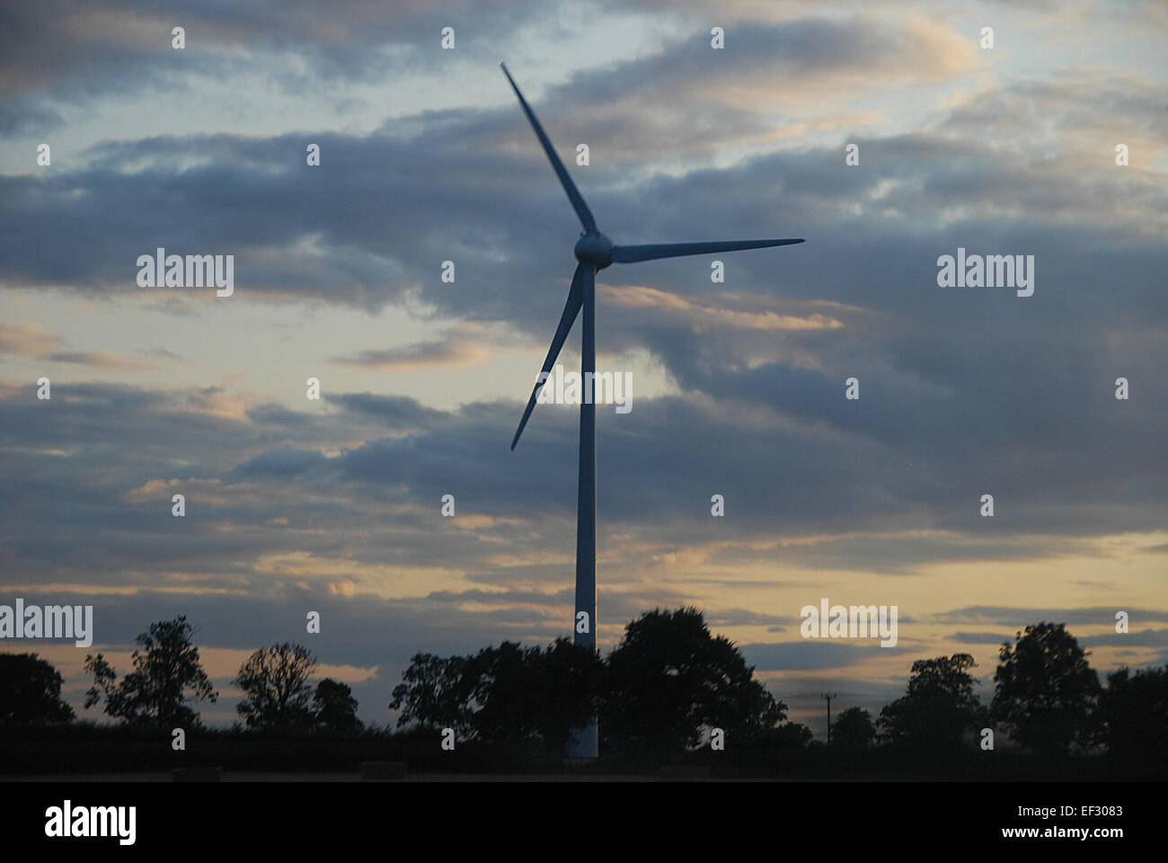 Wind turbine at dusk in Midlands, England, UK Stock Photo