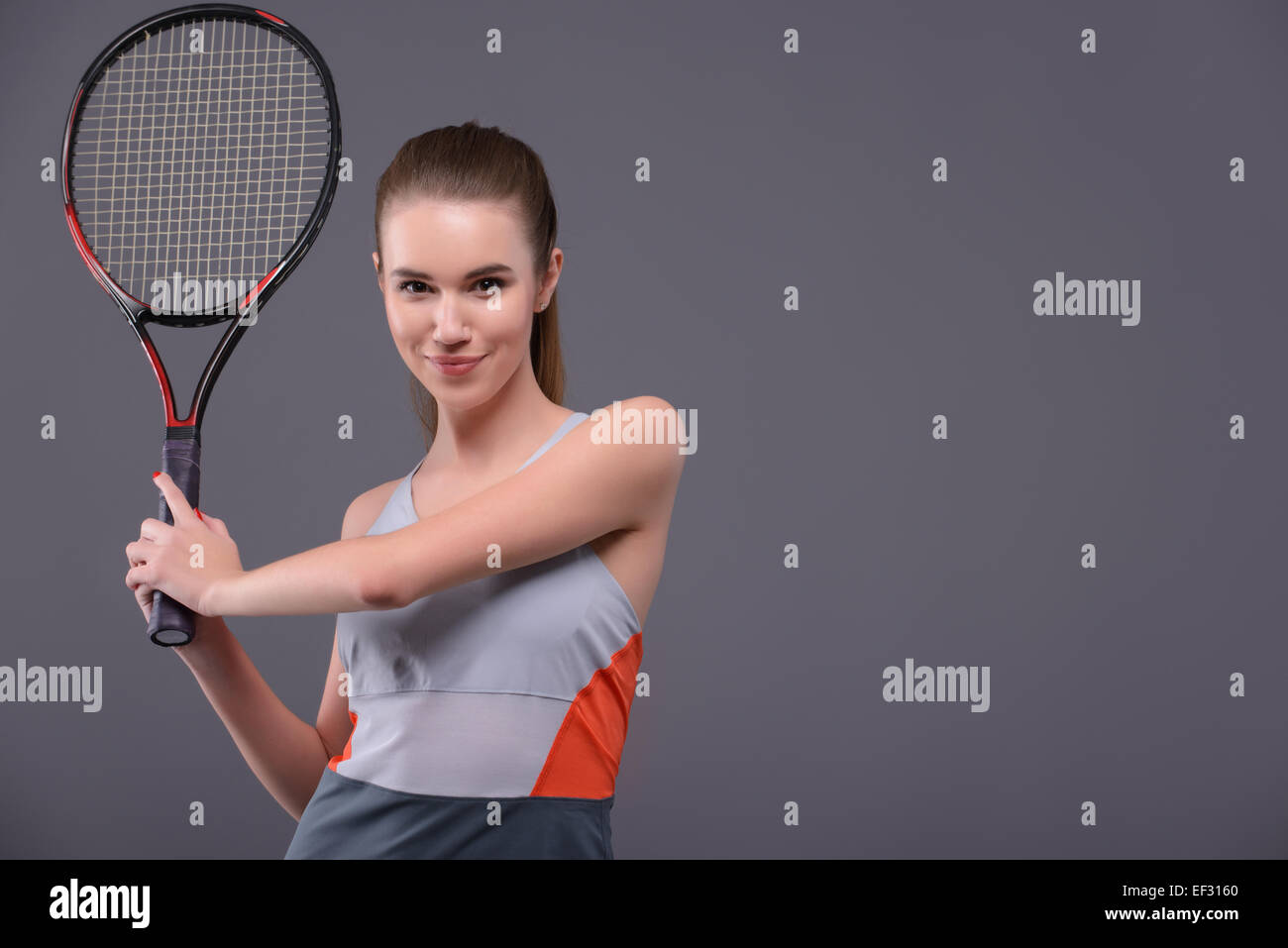 Tennis woman player with racket Stock Photo - Alamy