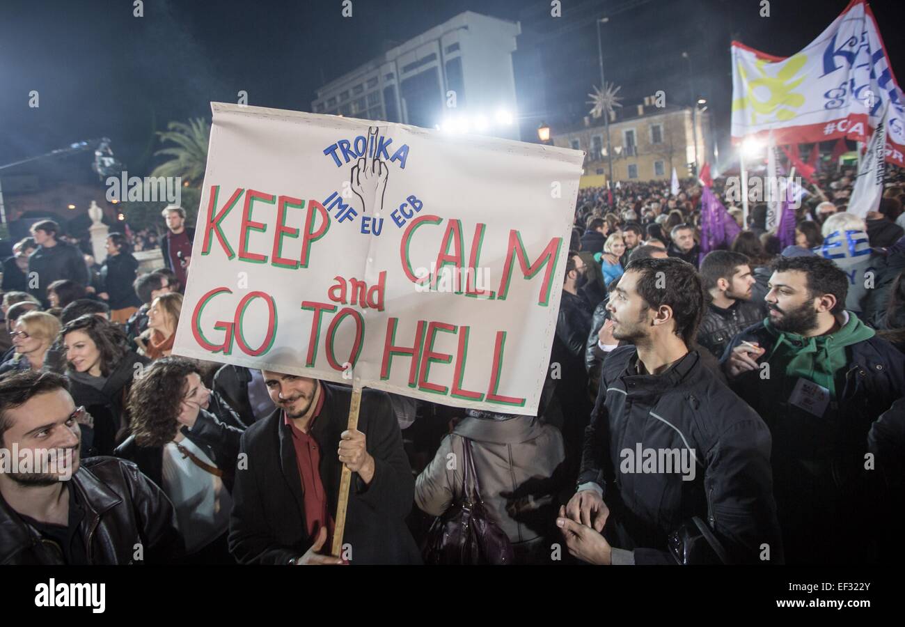 A Poster with the Slogan 'Troika- KEEP CALM AND GO TO HELL' is seen after Alexis Tsipras leader of the radical left main opposition party Syriza held his speech in front of the University after the Greece general elections in Athens, 25 January 2015. Greece's leftist, anti-austerity Syriza party and her leader Alexis Tsipras, has widened its lead at the top for the 25 January 2015 elections- riding a wave of anger over austerity measures imposed as a condition for an international bailout. Photo: Michael Kappeler/dpa Stock Photo