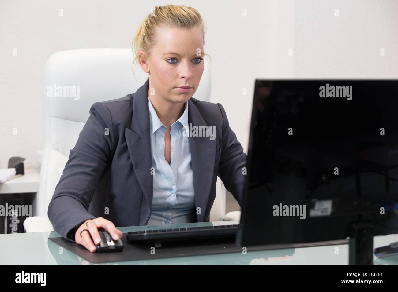 Business woman working on computer, 15 January 2015. Stock Photo