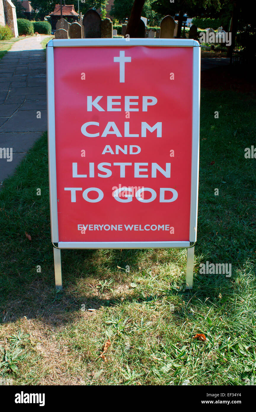 Keep calm and listen to God sign outside a church on Hayling Island, Hampshire, UK Stock Photo