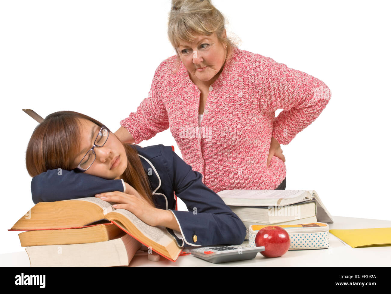 Angry teacher looking at sleeping student Stock Photo