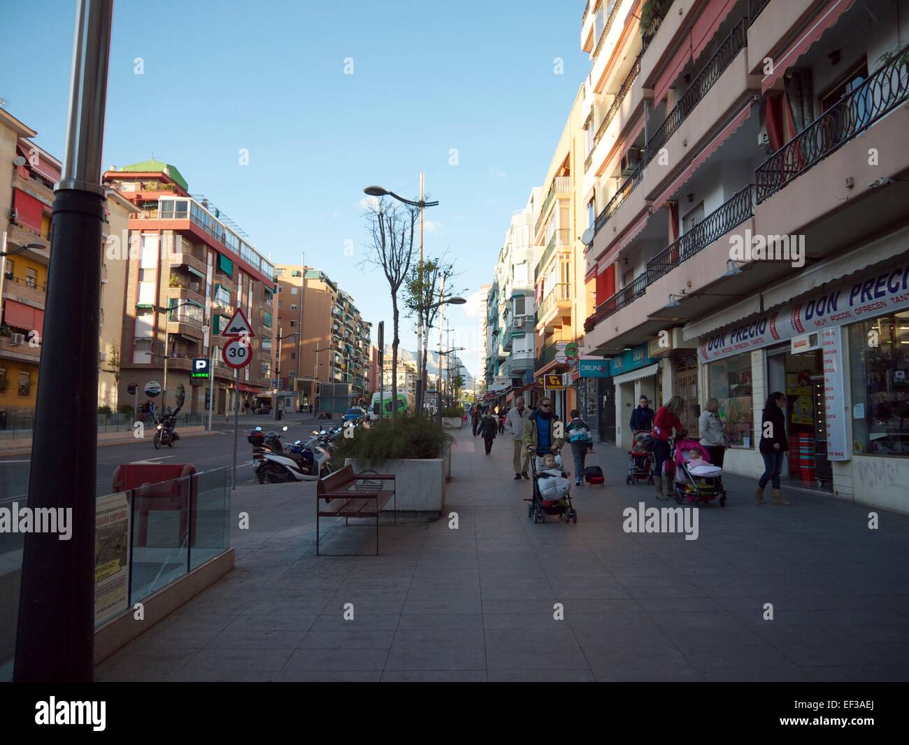 Typical shopping street in Benidorm, Spain Stock Photo