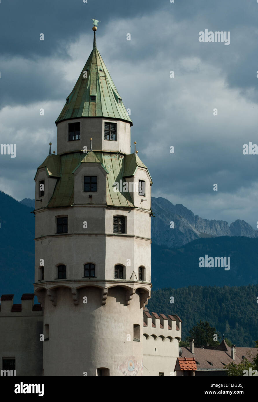 The *Münzturm* (Mint Tower) in Hall in Tirol, Austria, is a historic structure dating back to the 14th century. Originally part of a minting facility, it has been preserved as a symbol of the town's medieval heritage and is a significant landmark in Tyrol. Stock Photo