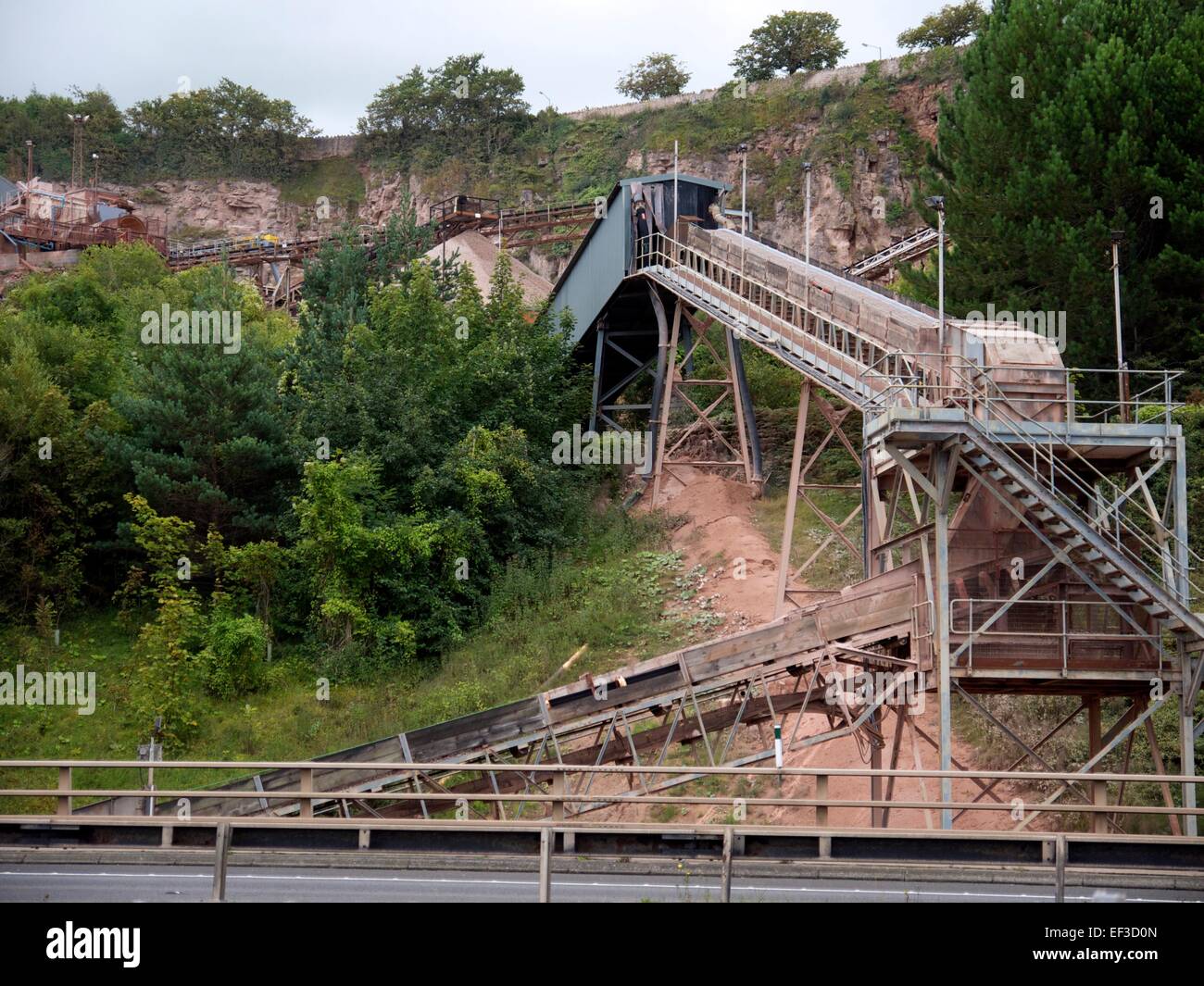 Stone quarry conveyor belts bringing stone from the quarry Stock Photo