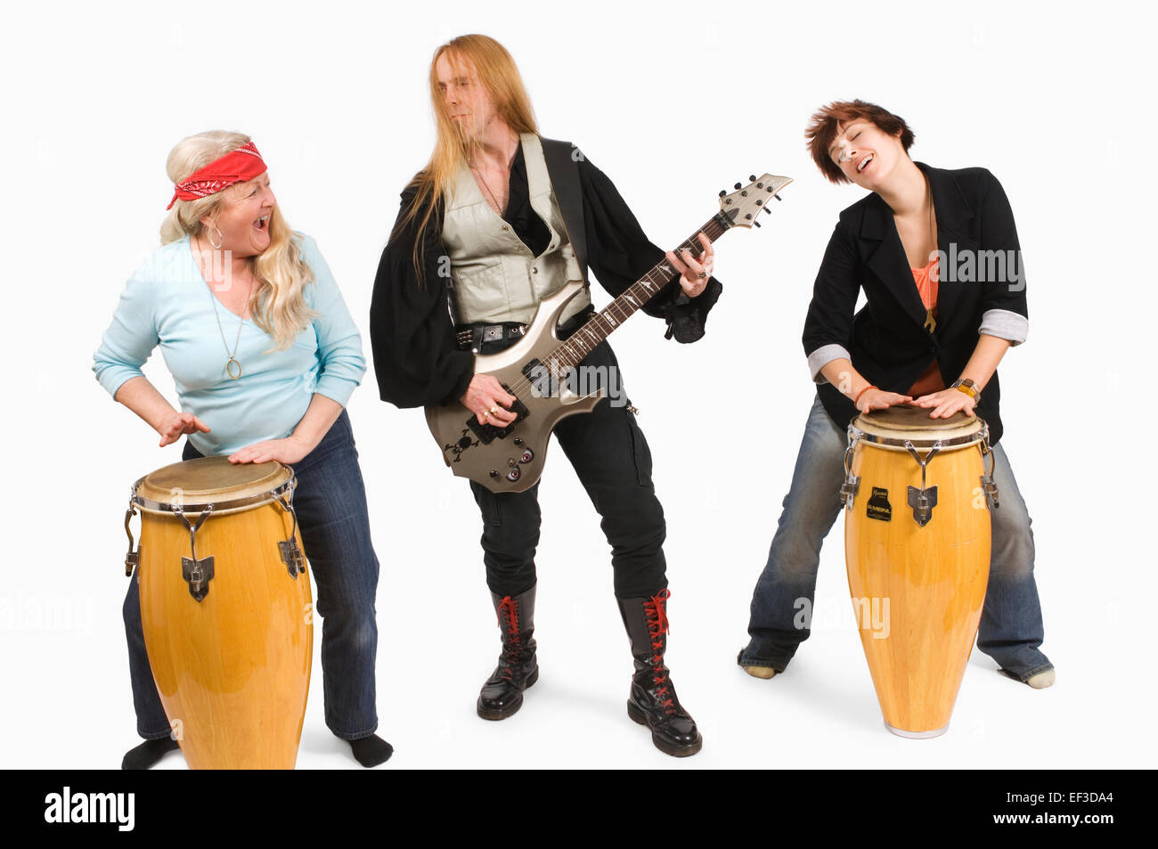 Three people playing instruments Stock Photo Alamy
