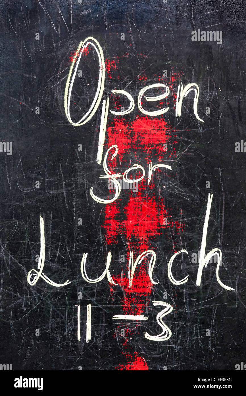 A will used blackboard sign with the words 'Open for Lunch' Stock Photo