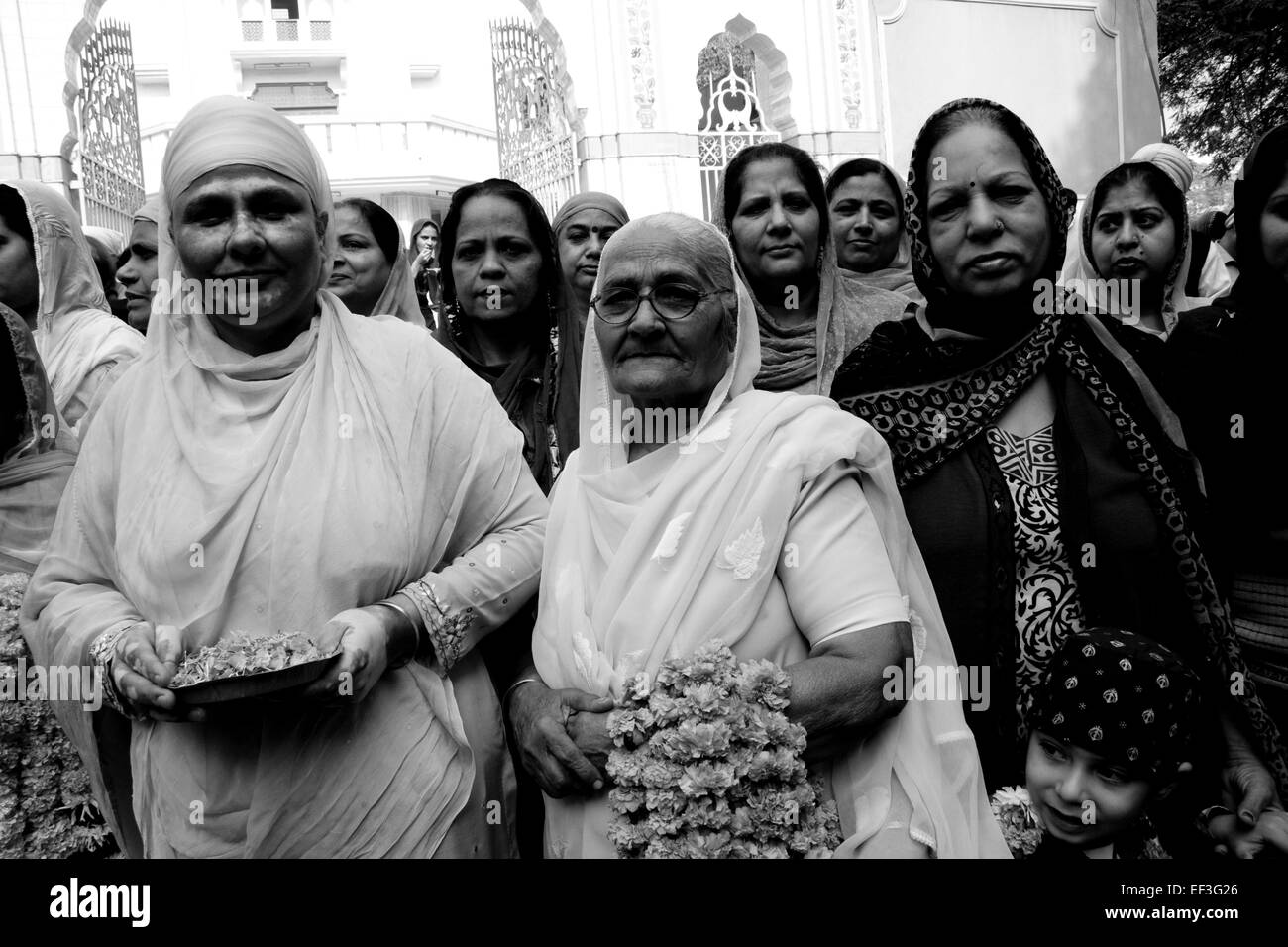 New Delhi, India - November 19, 2011: Sikh people celebrating Guru Nanak birth with a street parade and food distribution Stock Photo