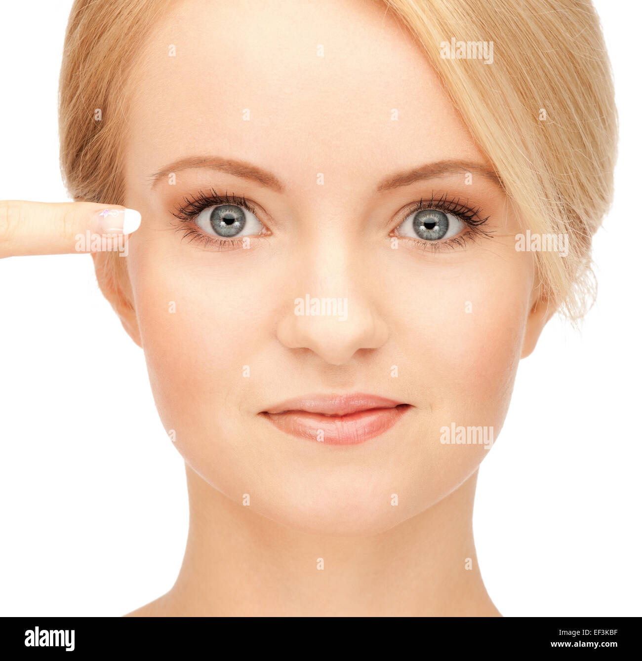beautiful woman pointing to eye Stock Photo Alamy