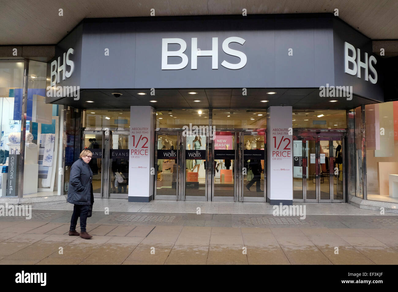 A woman walks past BHS store on Oxford Street, London Stock Photo