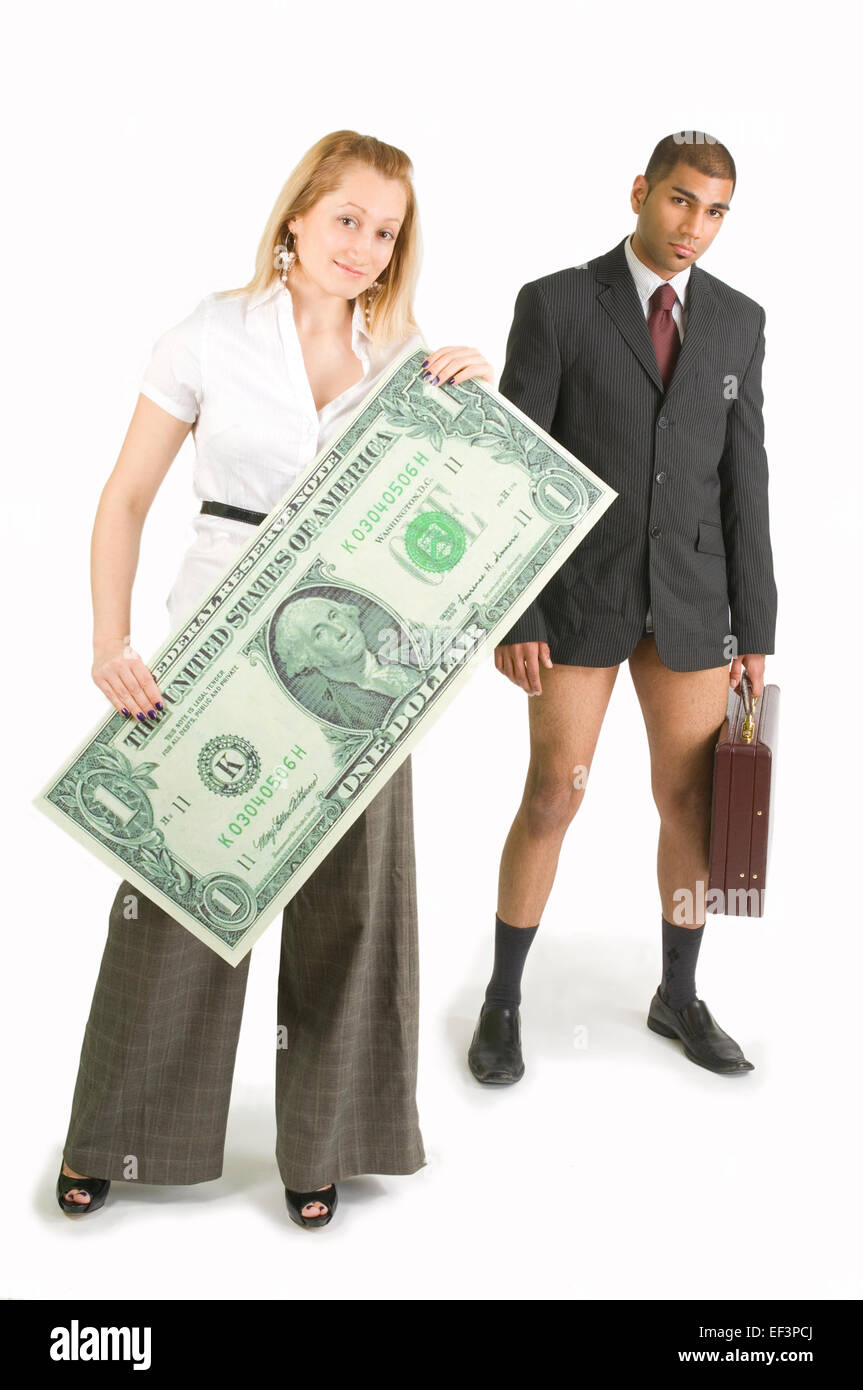 Businesswoman holding oversized dollar bill in front of pant less businessman Stock Photo