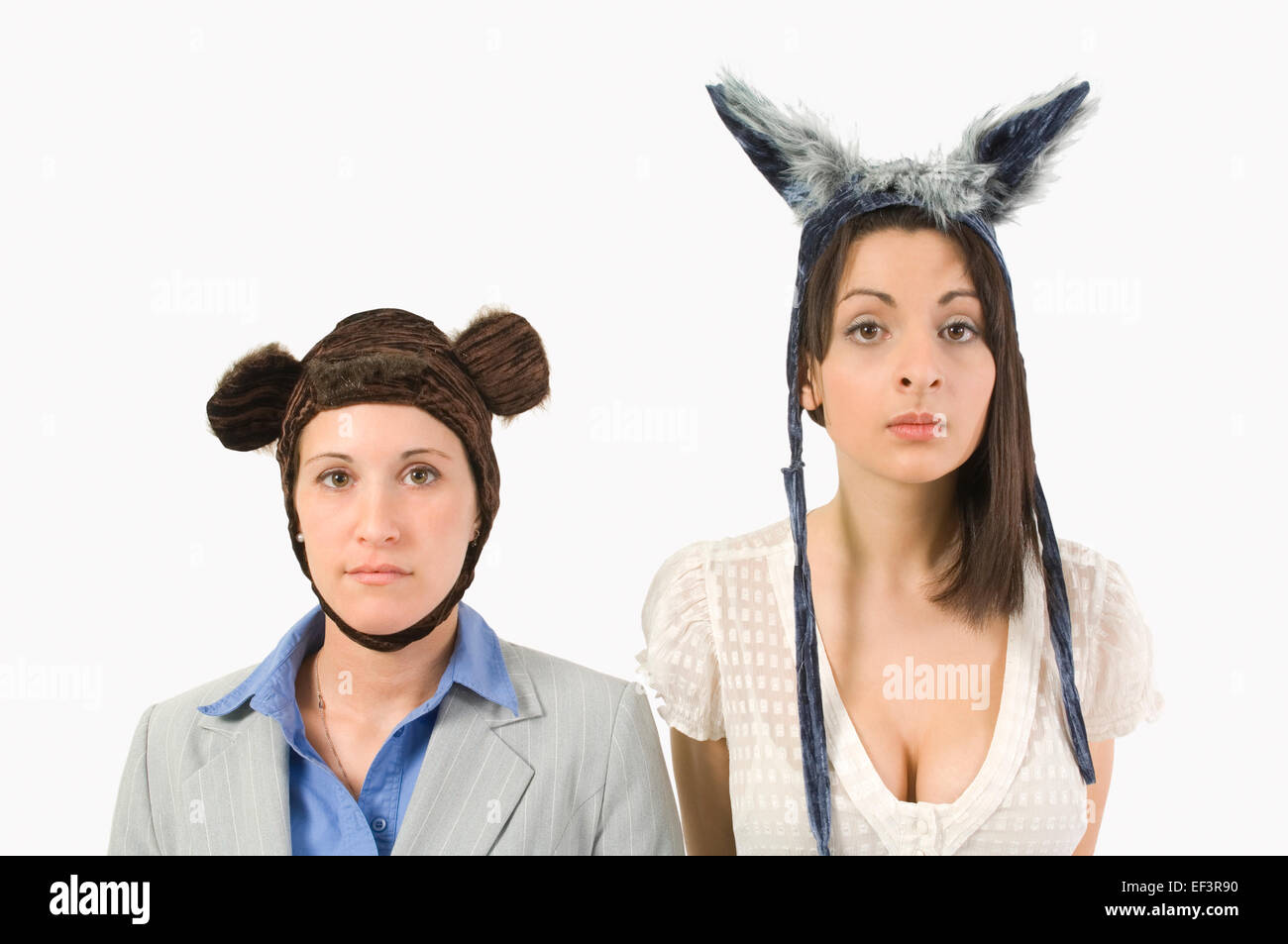 Two woman wearing winter hats with ears on them Stock Photo