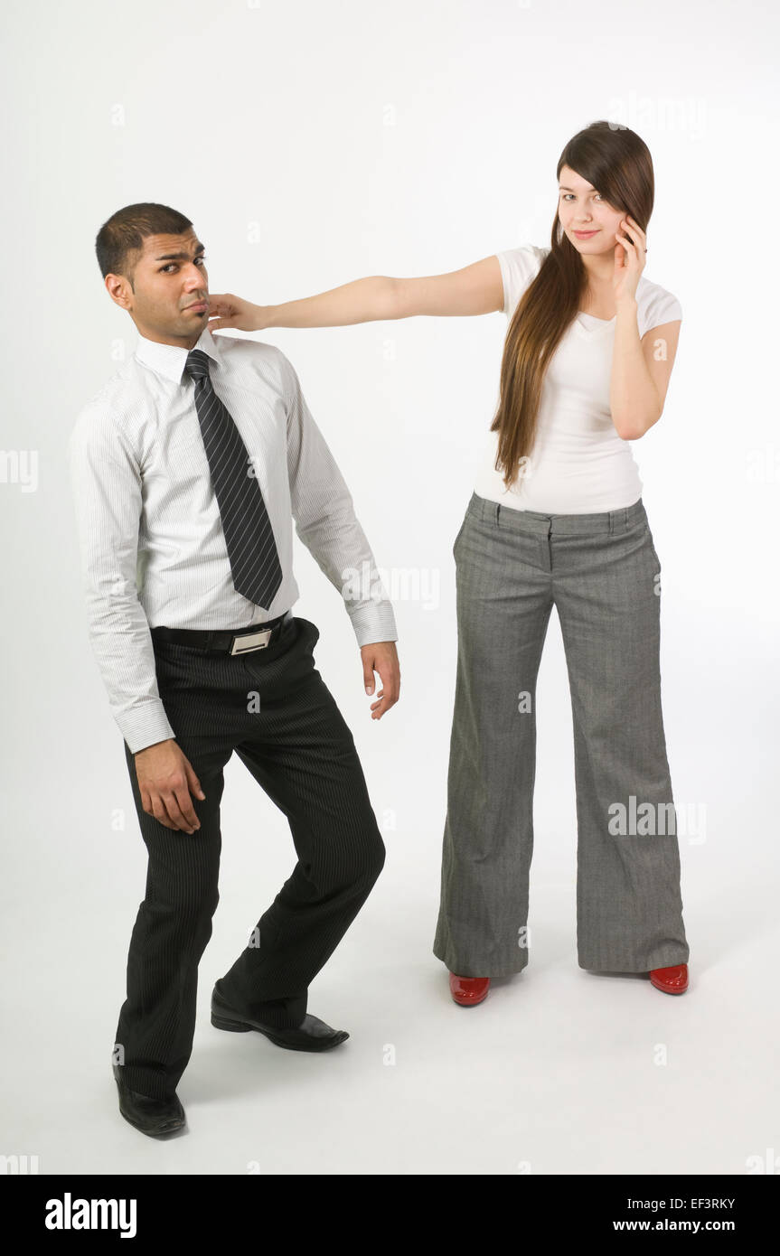 Woman pushing man away Stock Photo Alamy