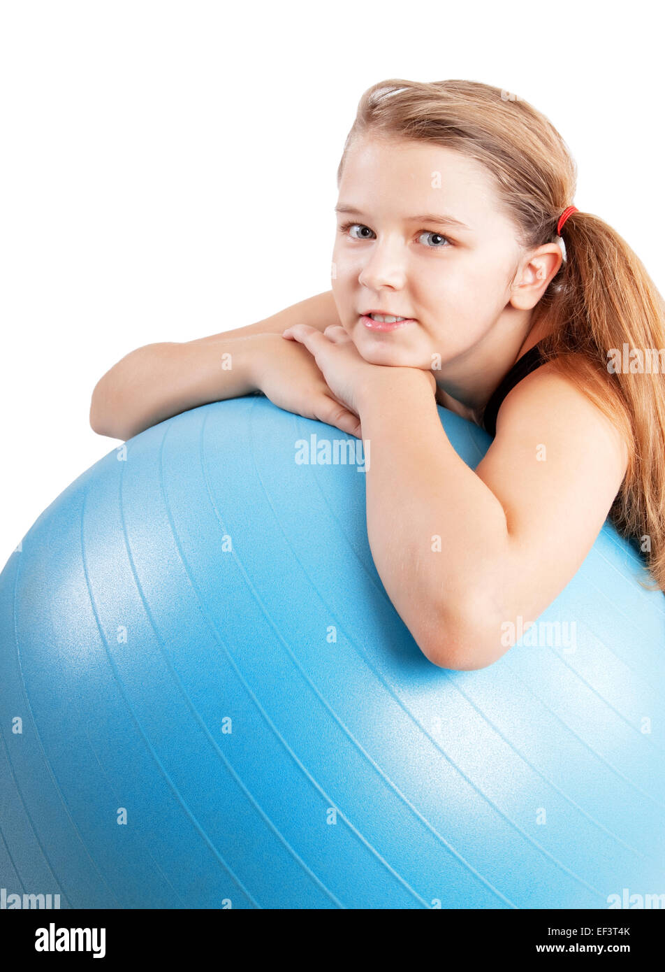 girl leaning on a fitness ball Stock Photo
