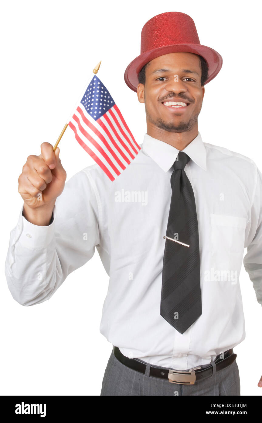 Man wearing red hat and holding small American flag Stock Photo
