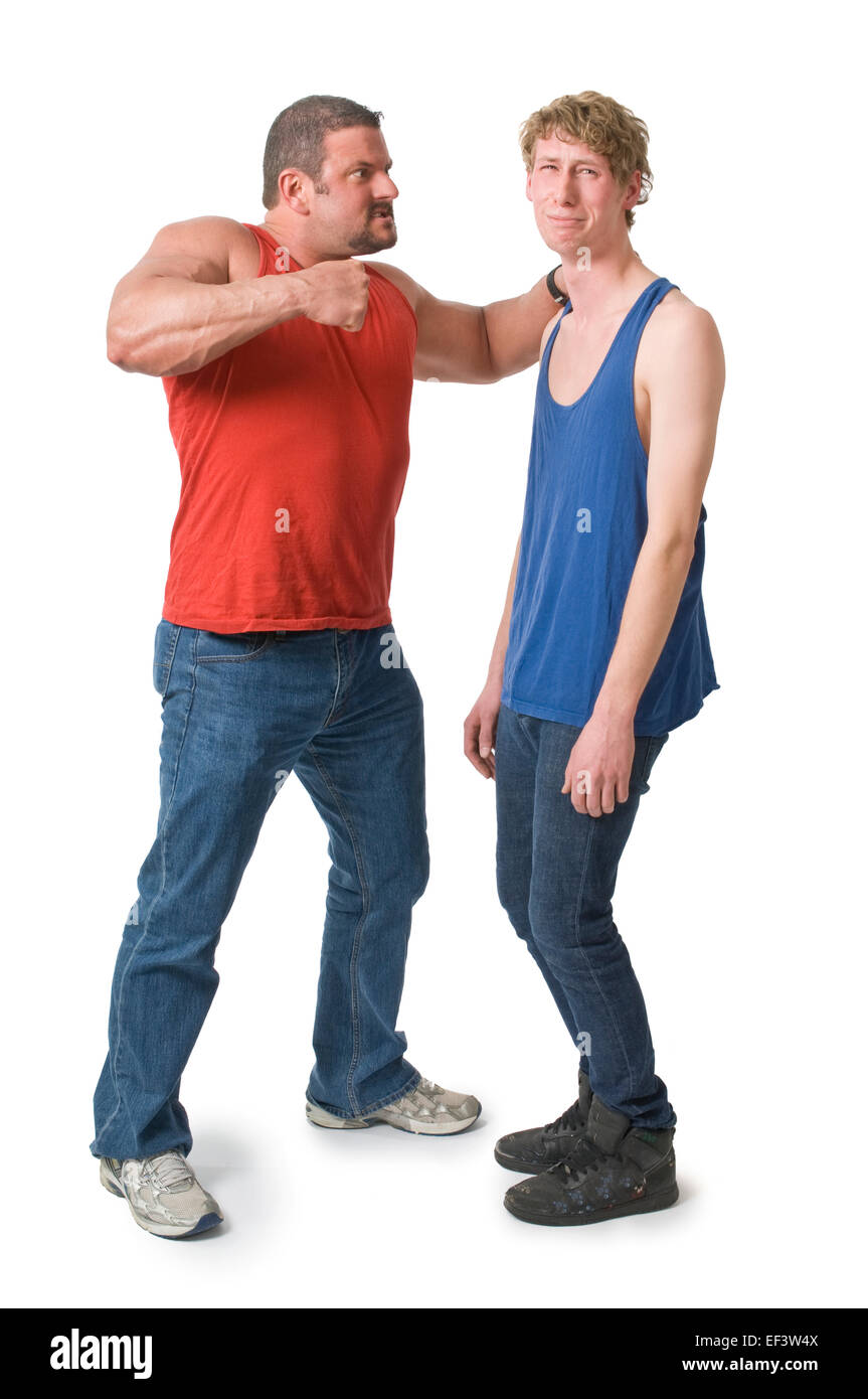 Muscular man about to punch a skinny man Stock Photo Alamy