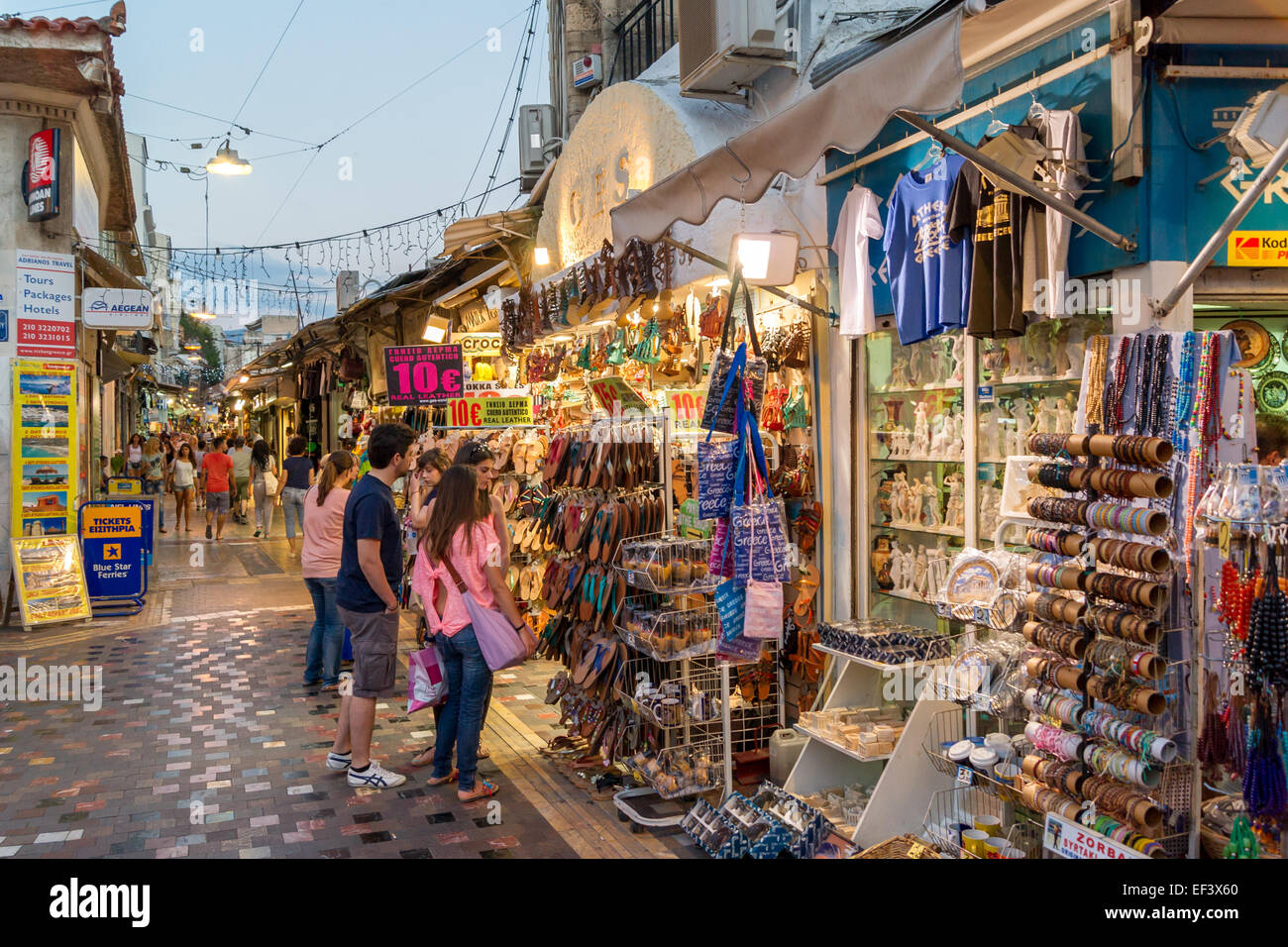 Tourists shopping at Ges Shoes which sells handmade Greek leather sandals  next to Avissynias Square. Athens, Greece Stock Photo - Alamy