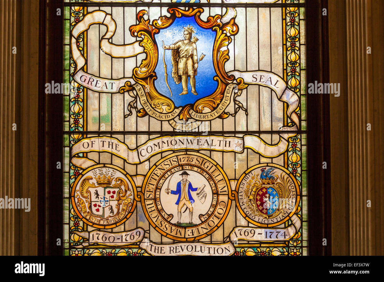 Stained glass window inscribed Great Seal of the Commonwealth on Grand