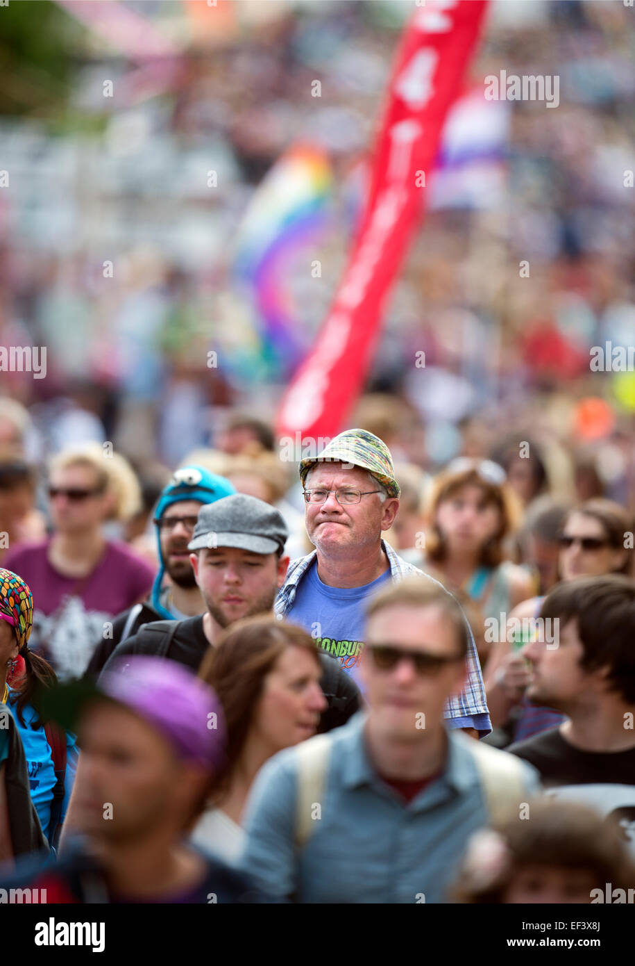 An older face in the crowd at Glastonbury Festival June 2014 UK Stock Photo