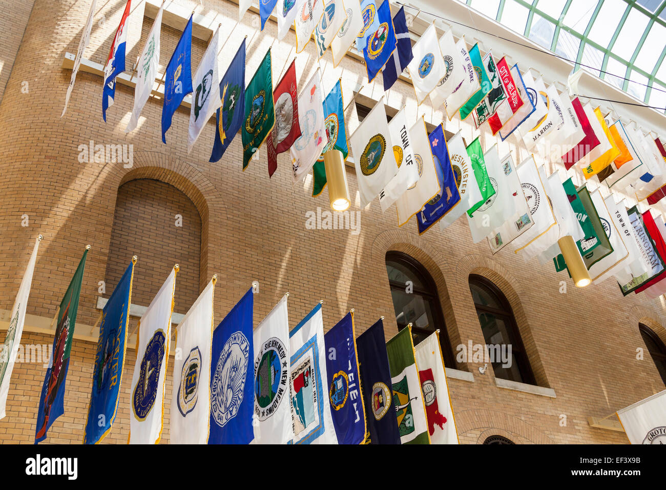 Town and city flags in the Great Hall of Flags, Massachusetts State House, Boston, Massachusetts, USA Stock Photo