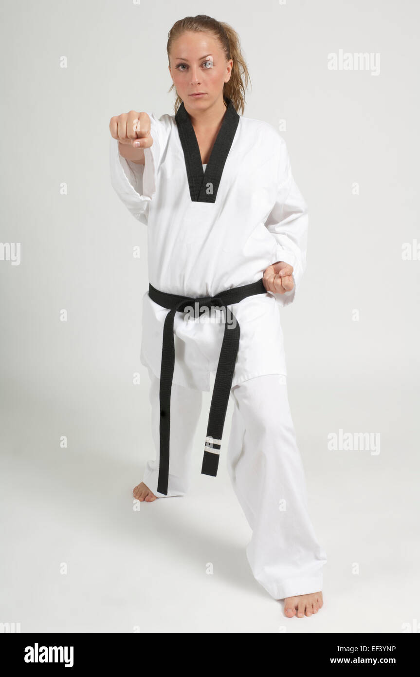 Woman wearing karate uniform Stock Photo