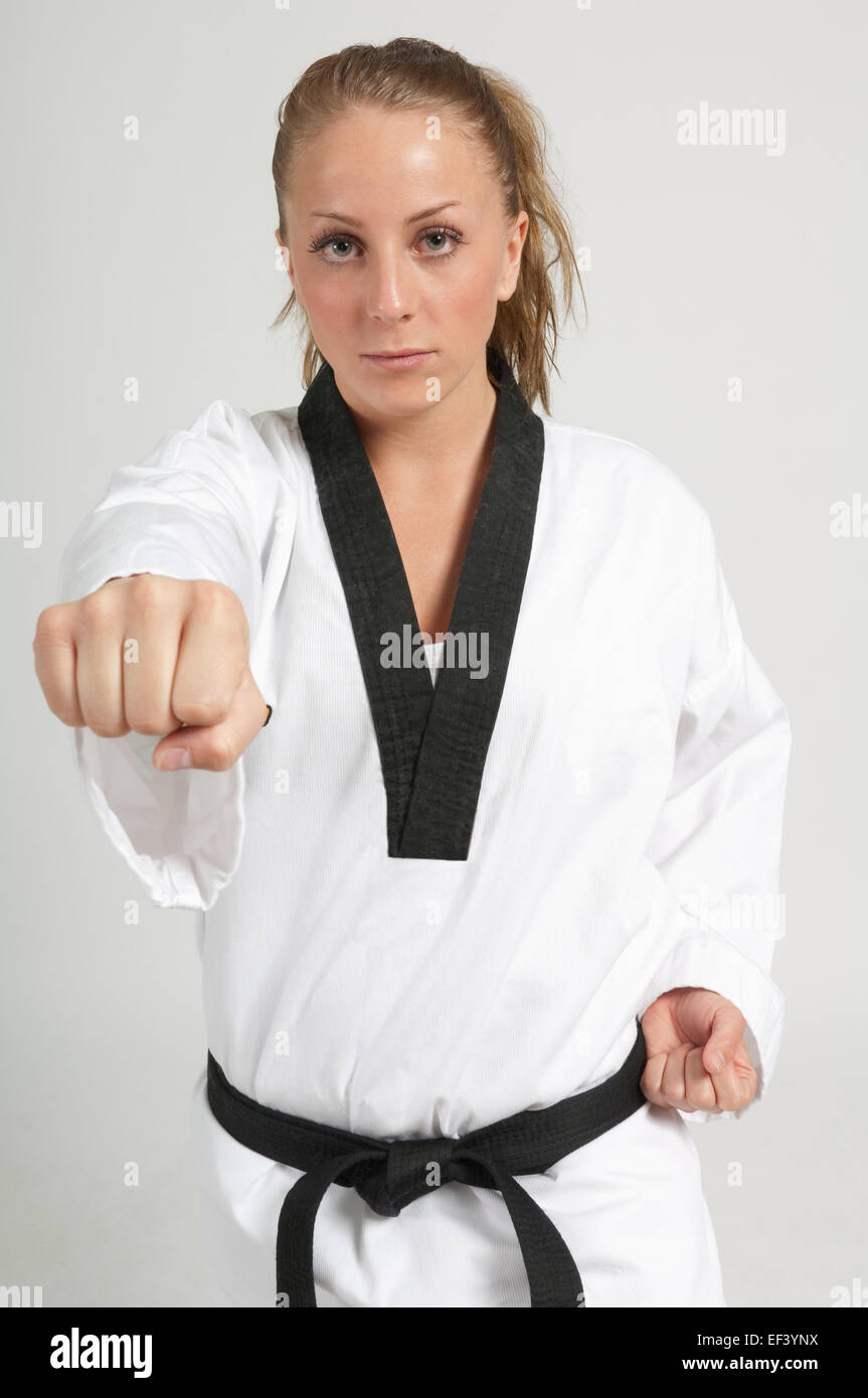 Woman wearing karate uniform Stock Photo - Alamy