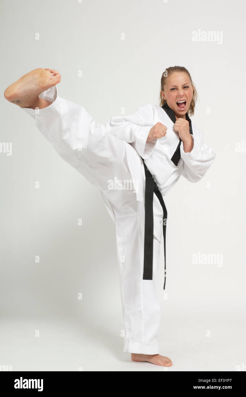 Woman wearing karate uniform Stock Photo - Alamy