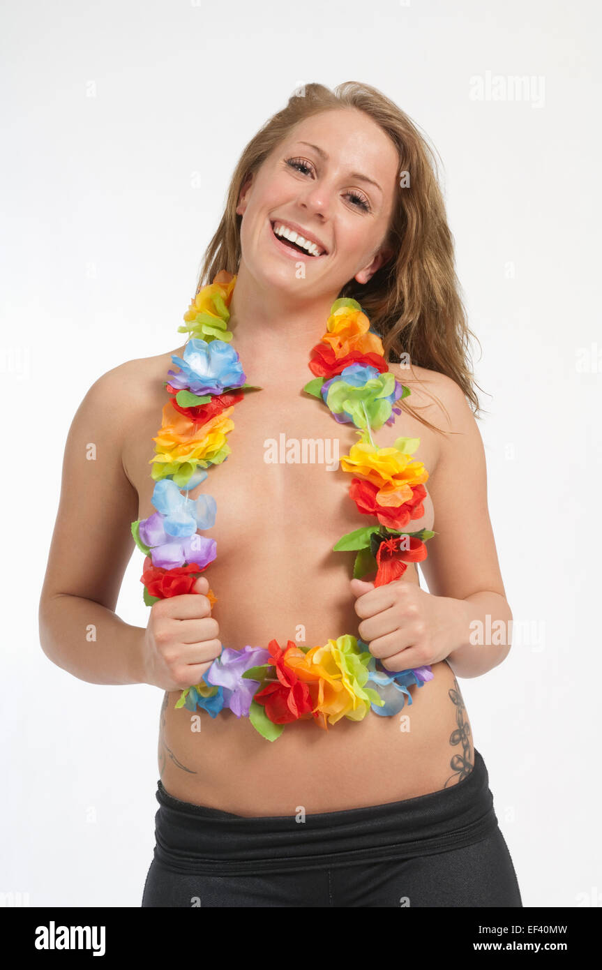 Shirtless woman wearing a Hawaiian lei Stock Photo