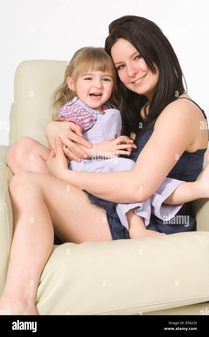 Mother hugging her daughter Stock Photo