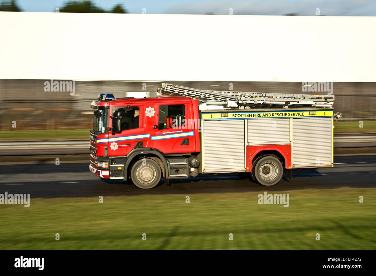 Fire Engine speeds through Gibson Street in Glasgow, Scotland, UK Stock  Photo - Alamy