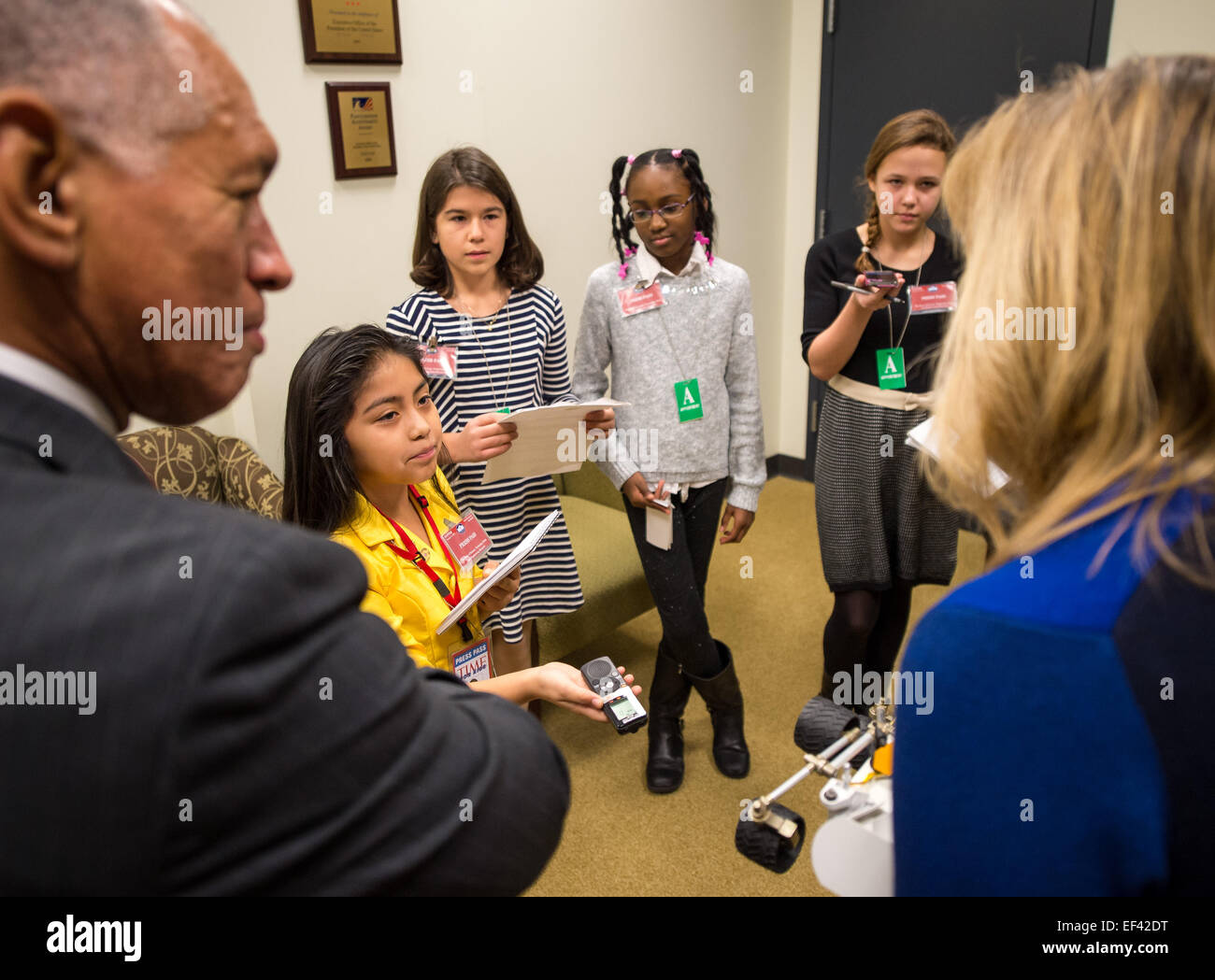 NASA Administrator Charles Bolden, left, and NASA Chief Scientist Ellen Stofan answer questions from kid reporters prior to the annual White House State of Science, Technology, Engineering, and Math (SoSTEM) address, Wednesday, Jan. 21, 2015, in the South Court Auditorium in the Eisenhower Executive Office Building on the White House complex in Washington. Stock Photo