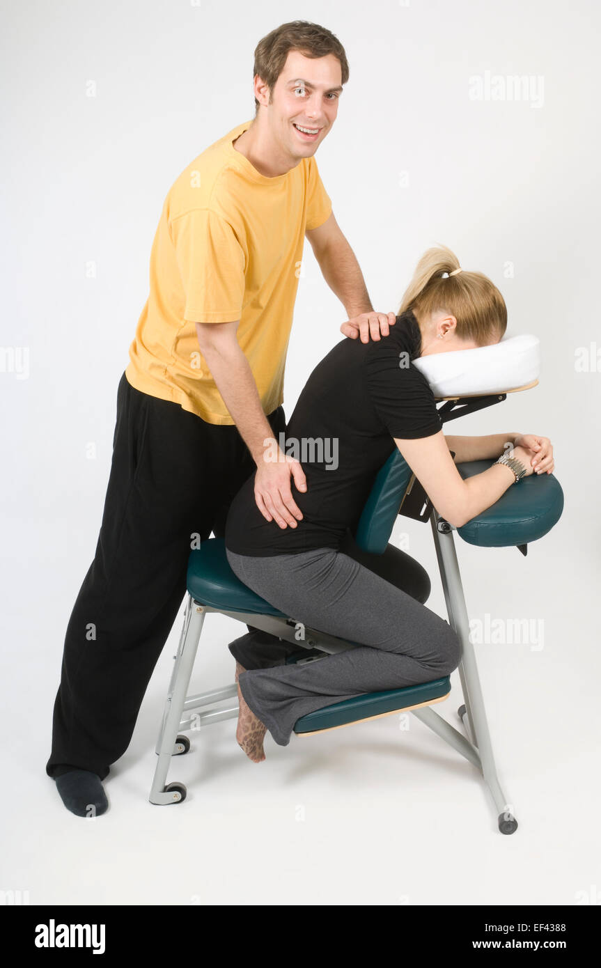 Man giving woman a back massage Stock Photo Alamy