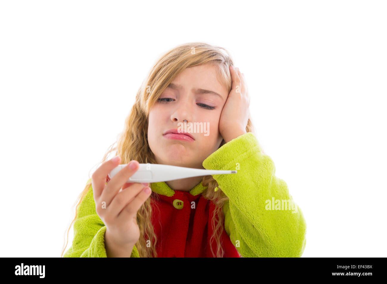 blond girl with thermometer and flu cold in pyjama and sad face Stock Photo