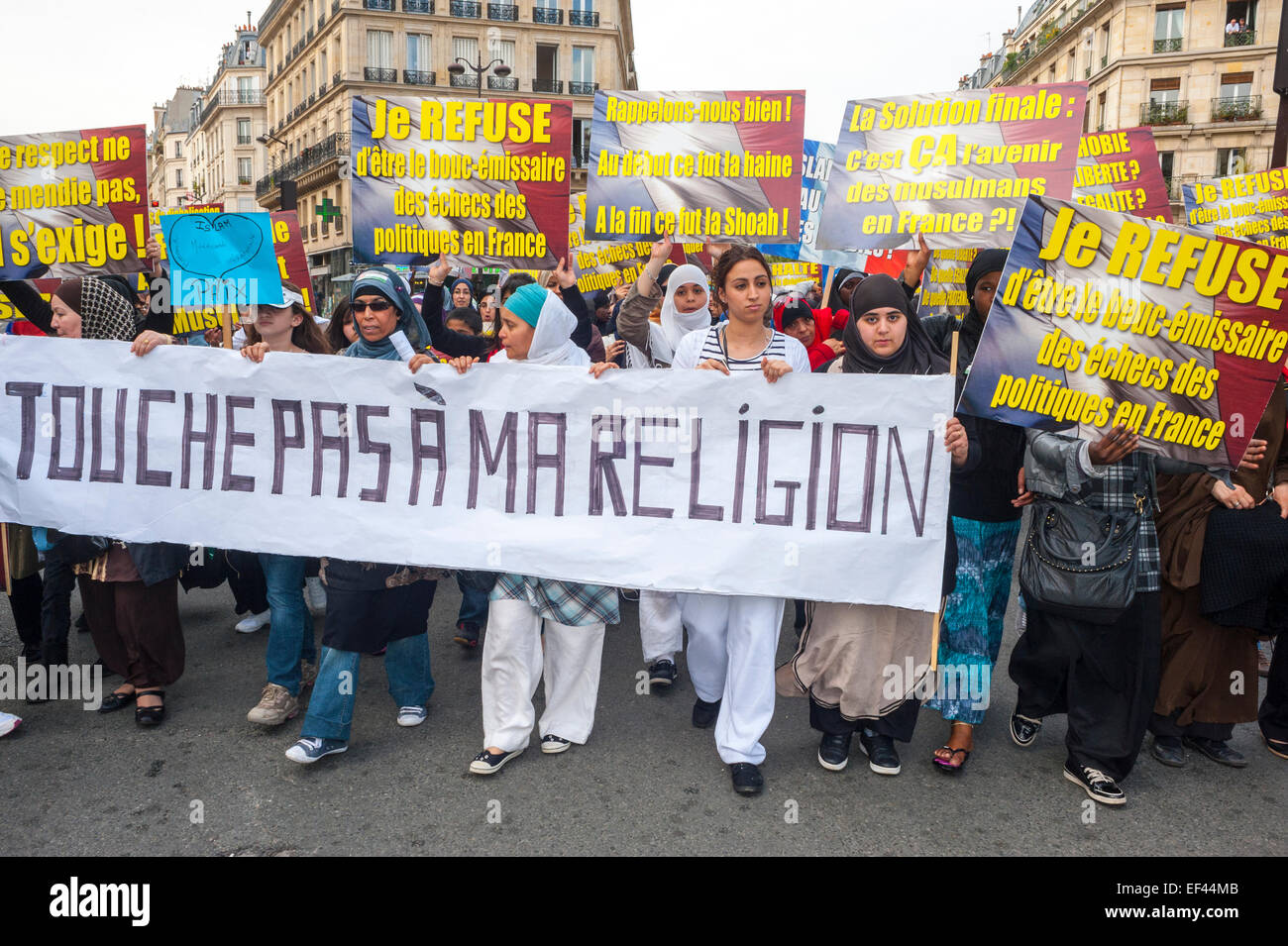 Paris, France, French Arab Muslims Demonstrating against discrimination Islamophobia, Racism, Veiled Muslim Women in traditional Dress Hijab, with Signs and Banners, woman in hajib, religion in politics Stock Photo