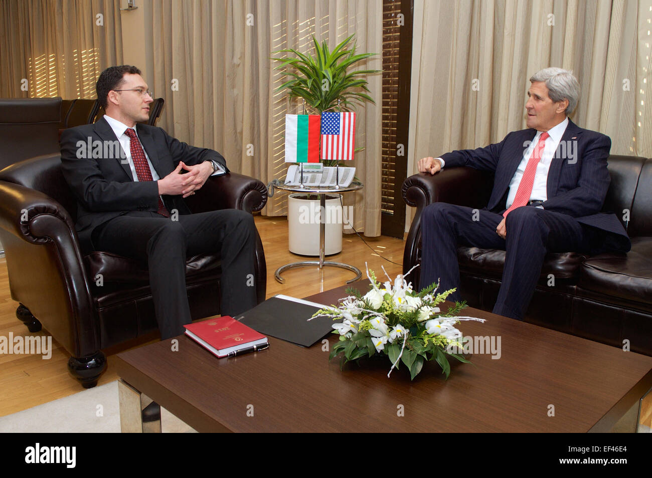 Bulgarian Foreign Minister Daniel Mitov sits with U.S. Secretary of State John Kerry after he arrived at the Ministry of Foreign Affairs in Sofia, Bulgaria, on January 15, 2015, for a one-on-one meeting and a working lunch. Stock Photo