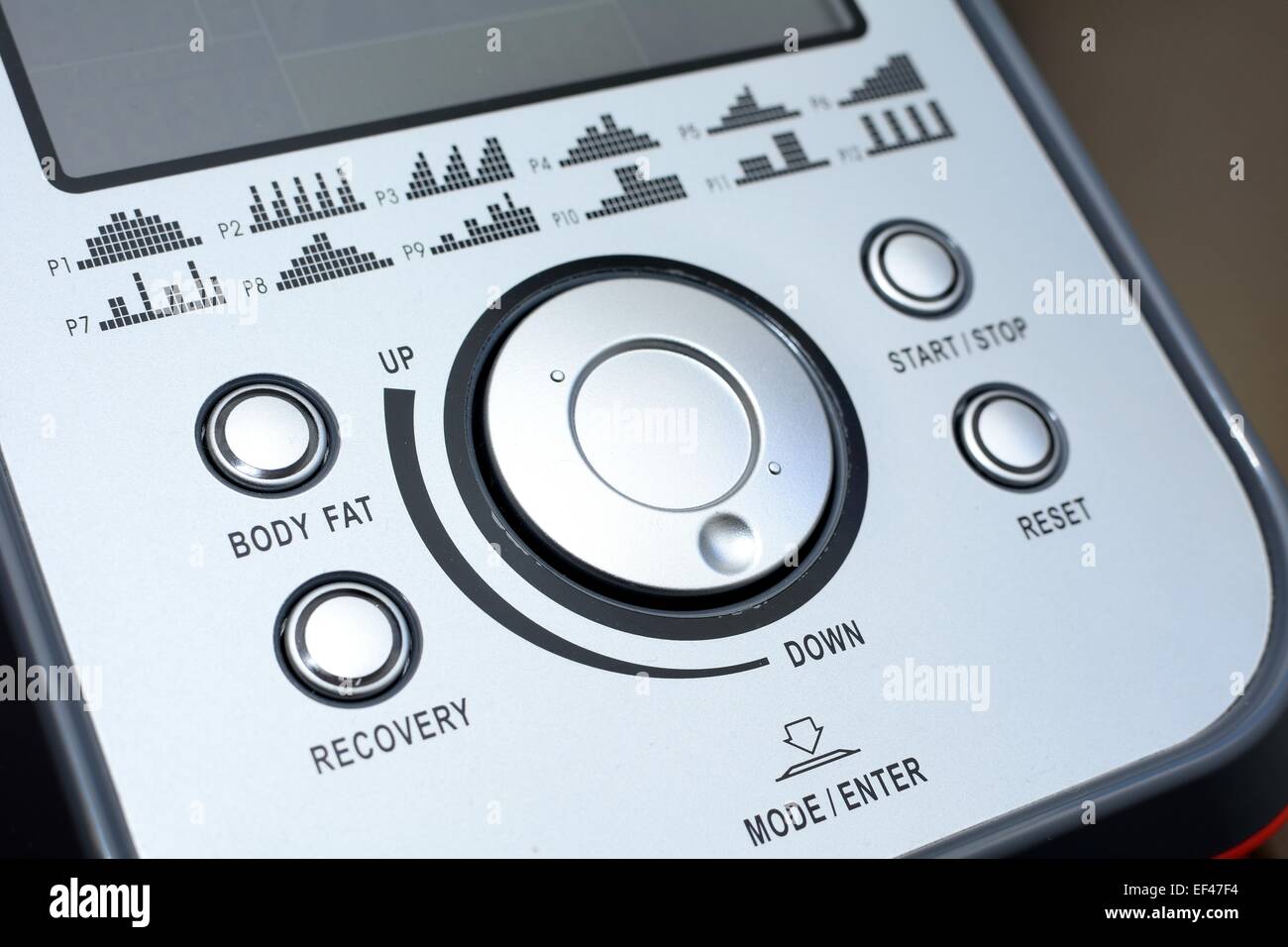 Control panel of the elliptical trainer with buttons and display
