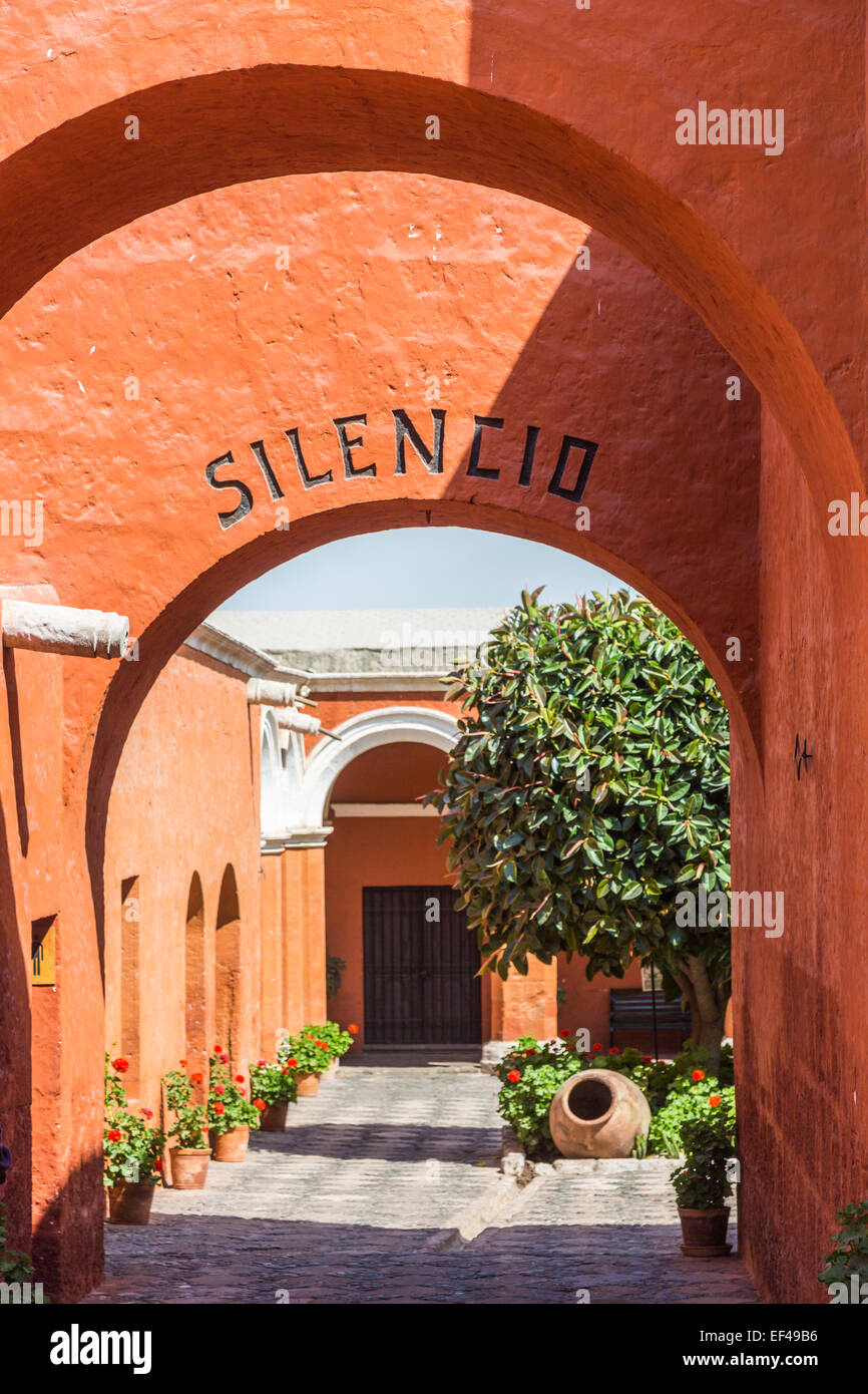 Entrance to the famous Santa Catalina Convent in Arequipa, Peru with 'Silencio' (silence) archway and courtyard, a leading sightseeing attraction Stock Photo
