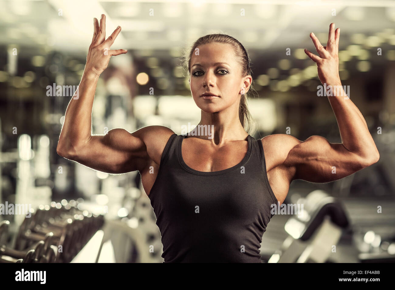 Young woman bodybuilder in gym Stock Photo Alamy