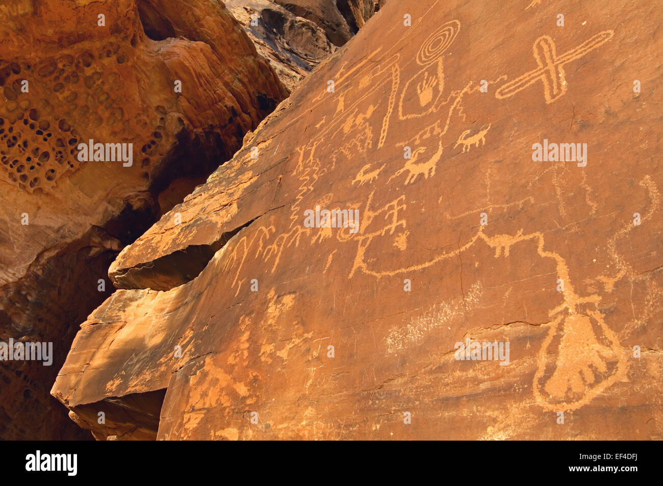 Petroglyphs on Atlatl Rock in Valley of Fire State Park, NV denote the long ago presence of Ancient Pueblo peoples, also known a Stock Photo