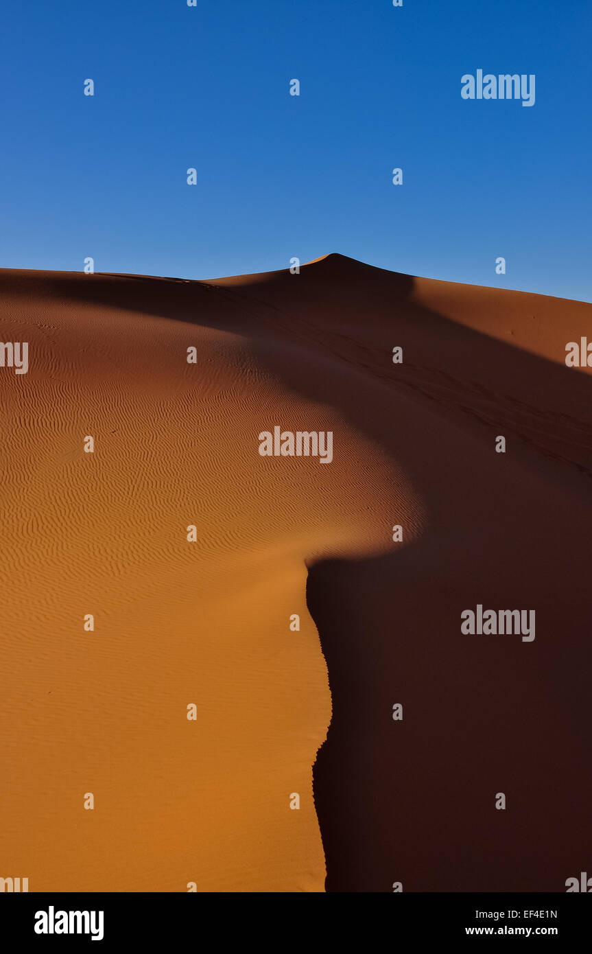 Sand dunes at sunrise, Merzouga, Morocco, Northern Africa Stock Photo