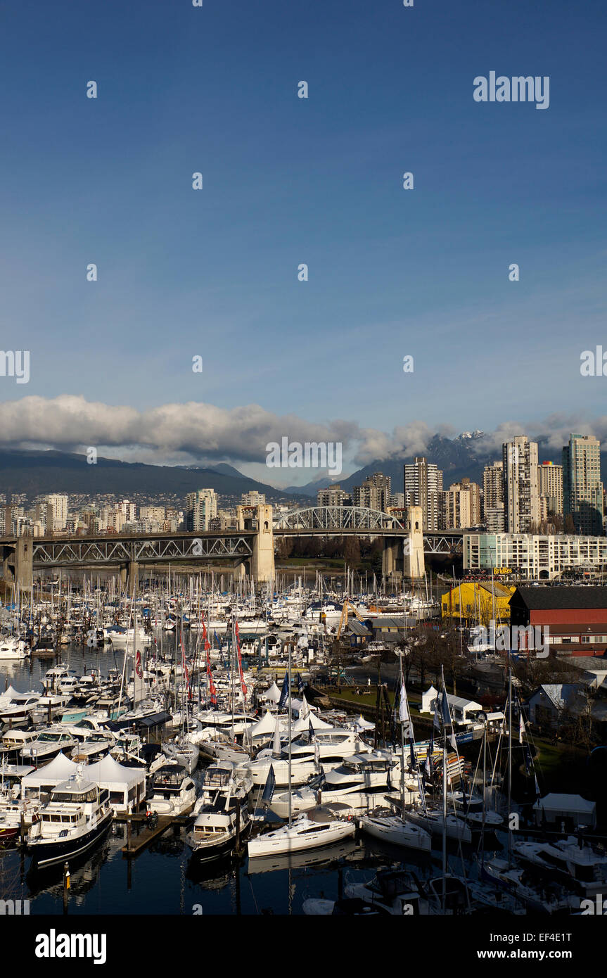 Recreational boats moored in False Creek with Burrard Bridge in background, Vancouver, BC, Canada Stock Photo