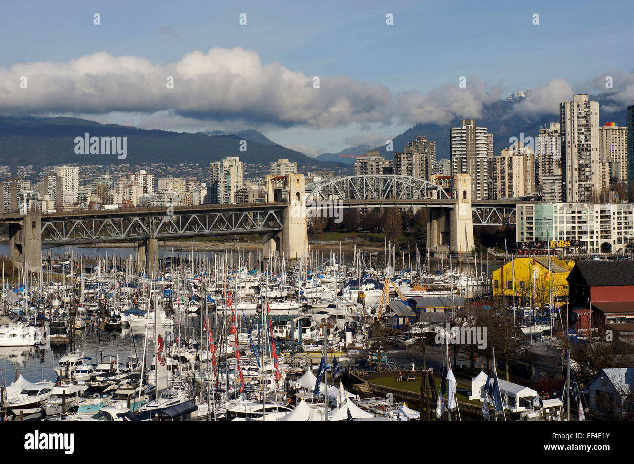 Recreational boats moored in False Creek with Burrard Bridge in background, Vancouver, BC, Canada Stock Photo