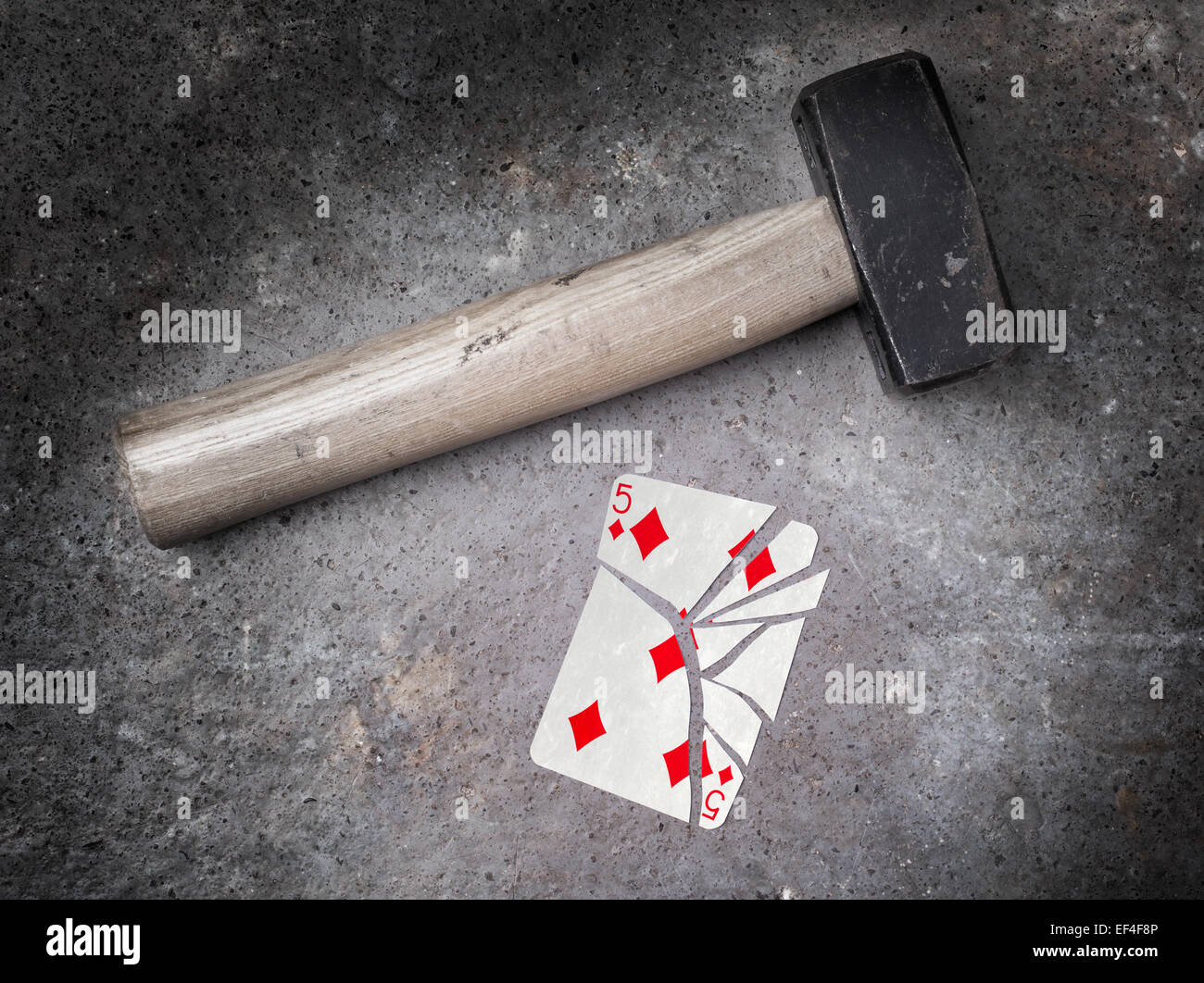 Hammer with a broken card, vintage look, five of diamonds Stock Photo